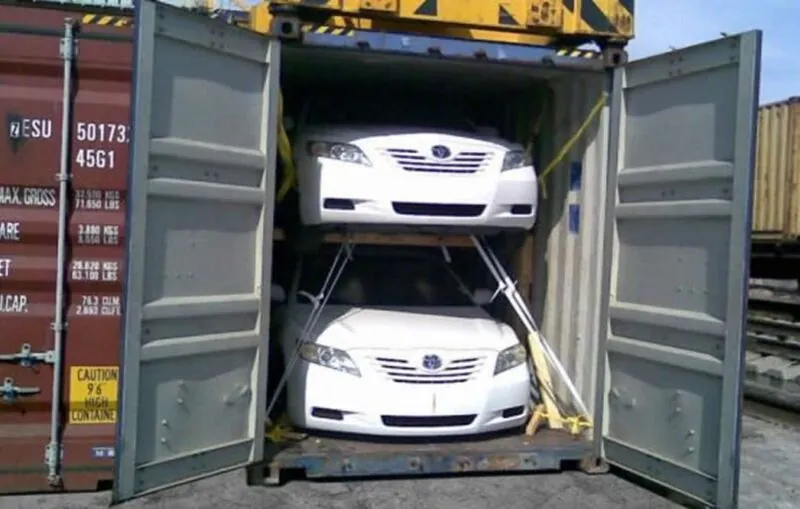 Vehicle importation container